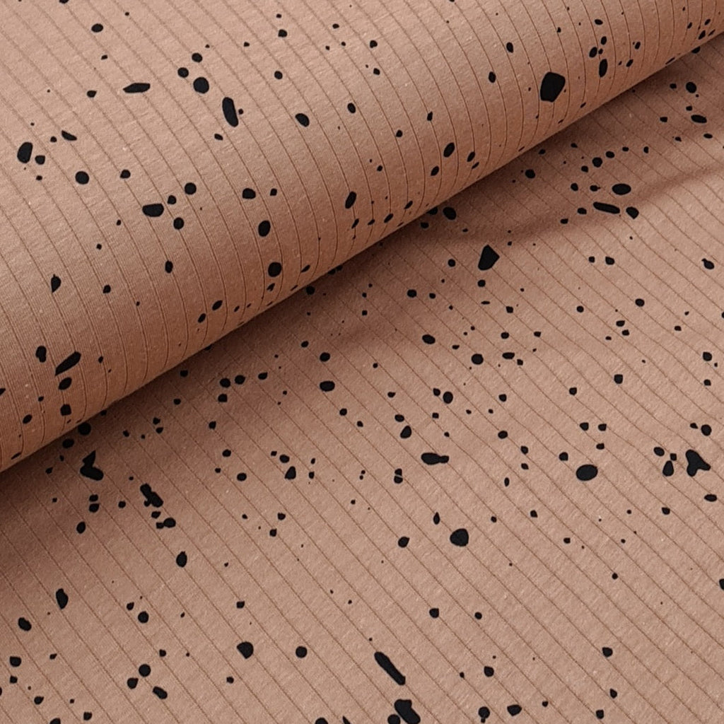 Black Splashes print on light brown ribbed jersey, very soft lightweight fabtic  Perfect for tops, dresses, leggings, blankets, bibs, pyjamas and more  150cm wide   97% Cotton, 3% Lycra